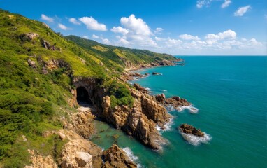 Obraz premium Aerial View of Coastal Caves and Rocky Shoreline in Vietnam