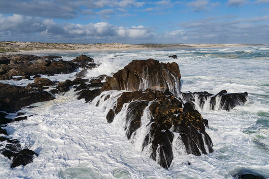 The western cape coastline, Incoming Waves Breaking on Rocks

default
West Coast National Park, Langebaan, Western Cape, South Africa