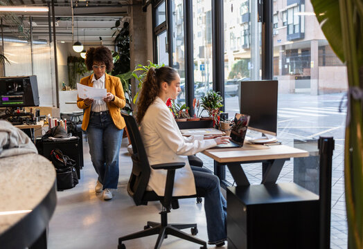 Leadership and productivity in a modern office with teamwork and innovation