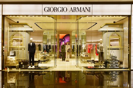 BANGKOK, THAILAND - March 5, 2026 : The luxury storefront of Giorgio Armani flagship store at ICONSIAM shopping mall. Featuring high-end fashion displays, mannequins, and elegant interior design.
