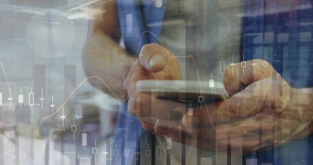 Scrolling hands wearing blue shirt viewing smartphone at office, showing candlestick charts overlay