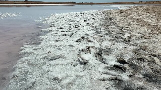 Close Up of White Salt Crystal Formations and Pink Water at the Saline Lake in Ras Muhammad National Park