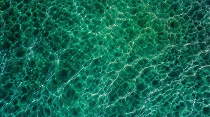 Fototapeta premium Clear Turquoise Ocean Water Texture Aerial Top View