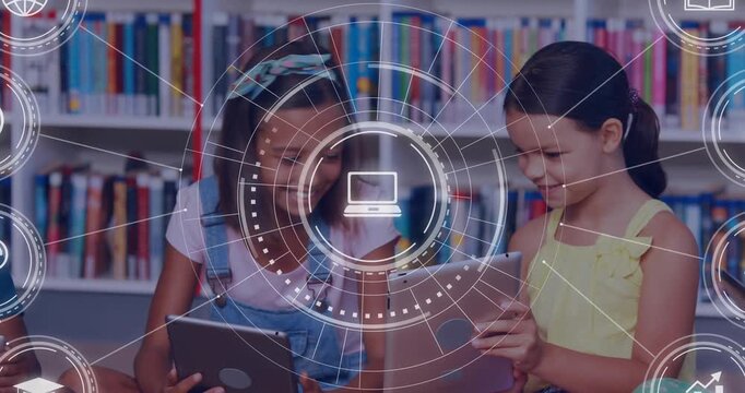 Two students tapping tablets in library starting HUD with icons and comparing screens for learning