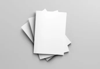 Three isolated magazine covers Mockup on white background with soft shadows. 3D rendering © sdecoret
