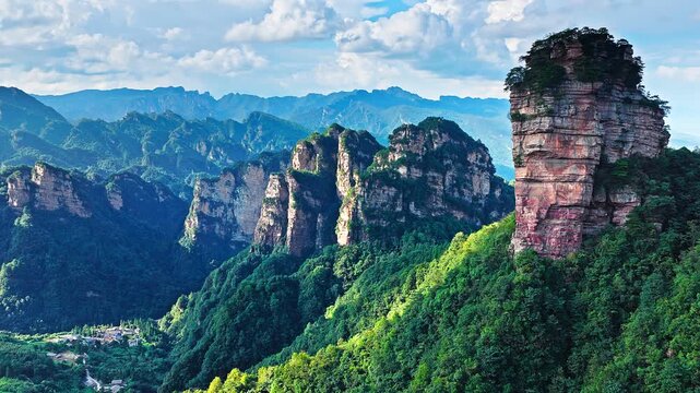 Spectacular quartz sandstone pillars and lush mountains in Zhangjiajie National Forest Park, Wulingyuan, Hunan, China. Avatar Hallelujah Mountain inspiration.