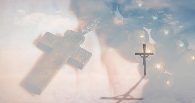 Soft focus shifting, cross pendant and crucifix clearing, shadow growing, sky fading, evoking calm