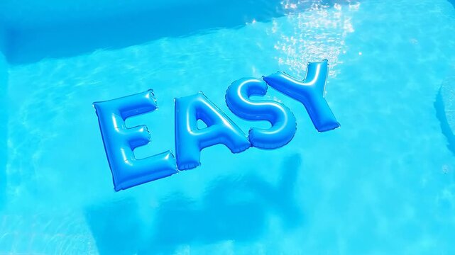 Blue inflatable letters spelling EASY float on clear blue swimming pool water