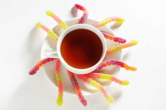 Tea cup with gummy worms