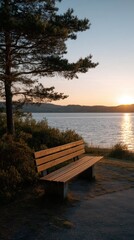 Fototapeta premium Serene Golden Hour Shot of an Empty Wooden Bench Overlooking a Calm Water Body