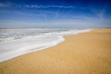 Waves breaking on the beach, dunes of Costa Nova, Beira Litoral, Portugal, Europe