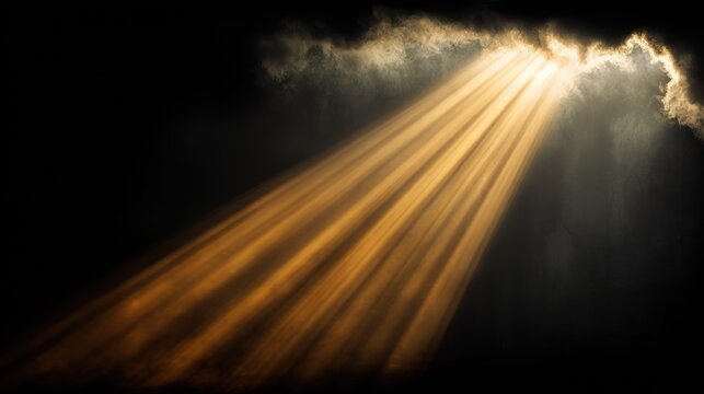 Bright golden sunbeams pierce through a dark cloud formation against a black background