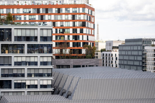 Modern residential building rooftop architecture in Paris France with urban pattern lines and open sky showing contemporary density and city design