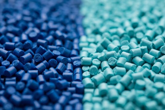 Extreme close up of blue and aqua plastic granules