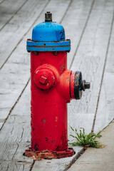 Quebec City, Canada - August 24, 2025: Red fire hydrant on a street in the historic Old Quebec district