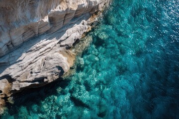 Aerial View: Clear Blue Water, Rock