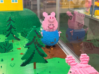 Naklejka premium Lego pig character in miniature diorama
