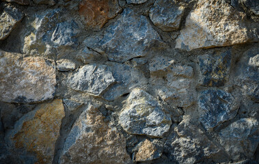 Natural Stone Wall Horizontal View with Branch Shadows