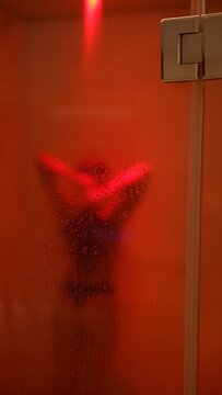 Bold performance capturing intimacy through fiery silhouette shape