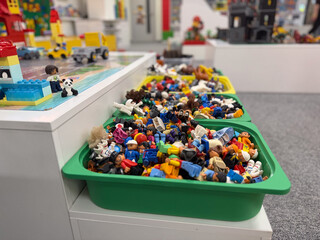 Fototapeta premium Bins of assorted toy figures on display