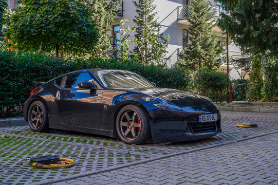 Tbilisi, Georgia, 10.29.2025 Black Nissan 370Z Parked in a Residential Complex