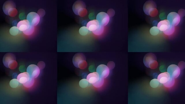 Starting playback, 3x3 grid of bokeh shifting and pulsing across dark backdrop for abstract art