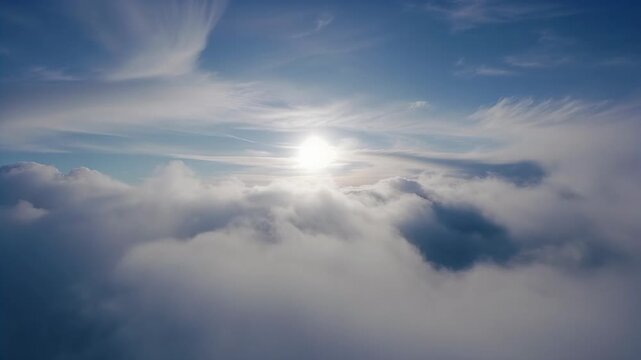 Gliding aerial platform revealing rounded clouds above cloud deck, casting sun halo and cirrus