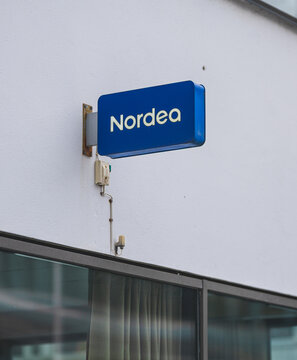 Gothenburg, Sweden - February 22 2026: Nordea bank branch sign mounted on modern office facade in Nordic city.