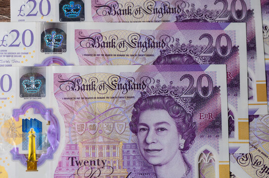 Twenty Pound Sterling Banknotes Spread on Table