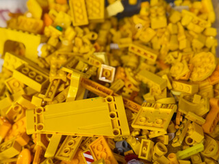 Naklejka premium Pile of yellow lego bricks