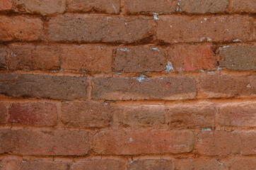 Old red brick wall as background