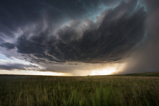 Supercell thunderstorm over the Great plains at sunset, Colorado, USA