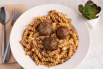 rotoni with herbs and cheese  top with meat balls