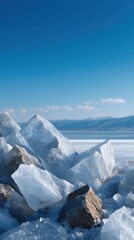 Obraz premium Stunning Vertical Shot of Glacial Ice Formations in Yukon Under Bright Blue Sky