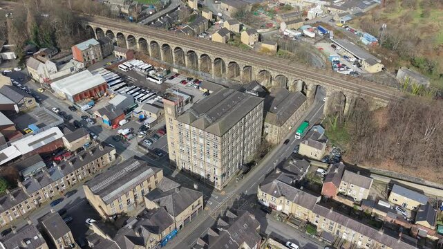 Aerial Pan of Milnsbridge, Huddersfield, Featuring Historic Industrial Architecture and Railway Infrastructure