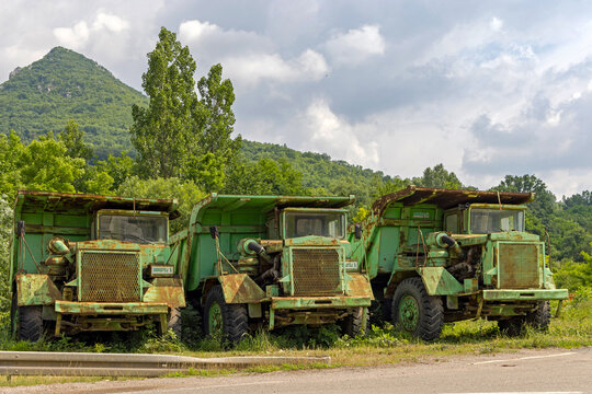 Old Green Dump Trucks at Rtanj Mountain in East Serbia