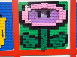 Naklejka premium Pink pixel flower lego mosaic