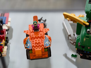 Naklejka premium Orange lego racer with minifigure