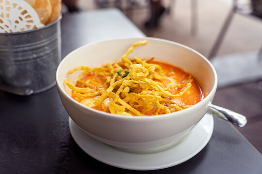 Vegetarian Northern Thai khao soi soup with egg protein and crispy noodles on top, Chiang Mai, Thailand