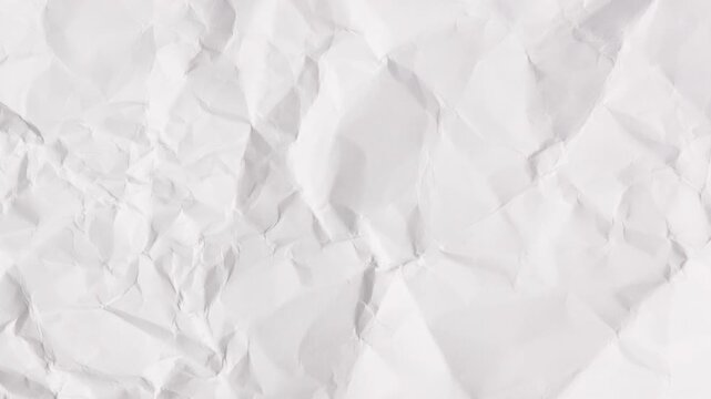 White crumpled paper stop motion background texture. Seamless looping in 4k
