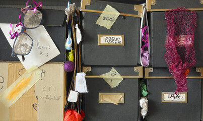 Forgotten grungy file folders,ringbinders and messy cardboard storage boxes. Business concept for...