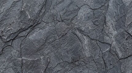 Naklejka premium macro photography, dark gray slate rock texture, bakground, natural rugged stone wall surface