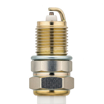 Close-up view of a brass-colored spark plug with visible threading and electrode gap.