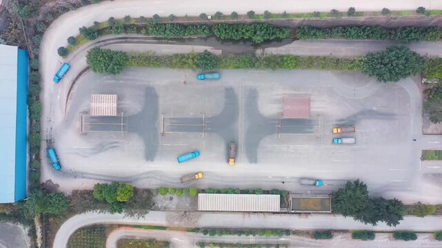 Aerial View of Driver Training School with Vehicles and Parking Areas