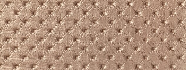 Fototapeta premium Light brown leather texture with capitone pattern, macro background of tan retro Chesterfield vintage textile fabric