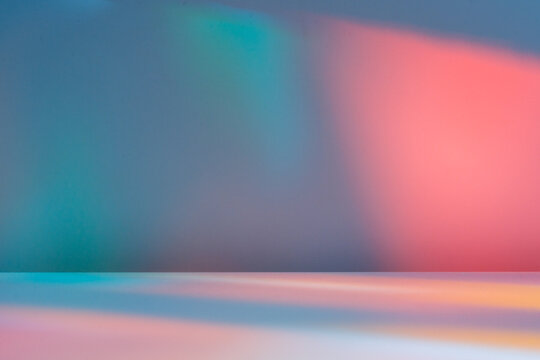 Pink pastel light on wall. Stained glass multicolor background.