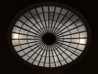 Naklejka premium a circular oculus (skylight) within Somerset House in London, which is designed to allow natural light to illuminate the interior space below. use it as your Wallpaper, Poster and Copy space, Selectiv