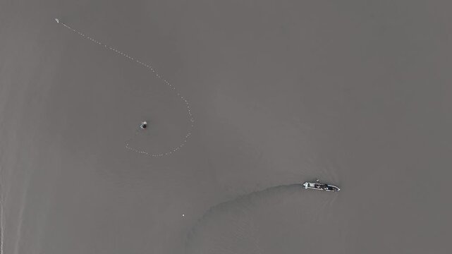 Fishermen with small boats and simple equipment have been fishing since early morning, near the mouth of the Payeti River, directly facing the Waingapu sea 