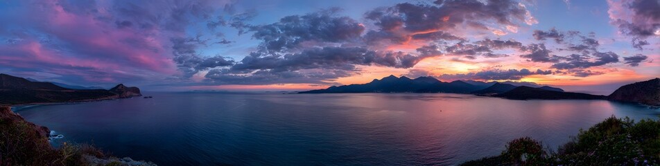 The majestic sunset over the tranquil lake, painting the sky with vibrant colors. The scene evokes a sense of peace and natural beauty