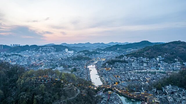 Fenghuang Ancient Town Aerial View at Sunset with Tuojiang River and Mountain Landscape